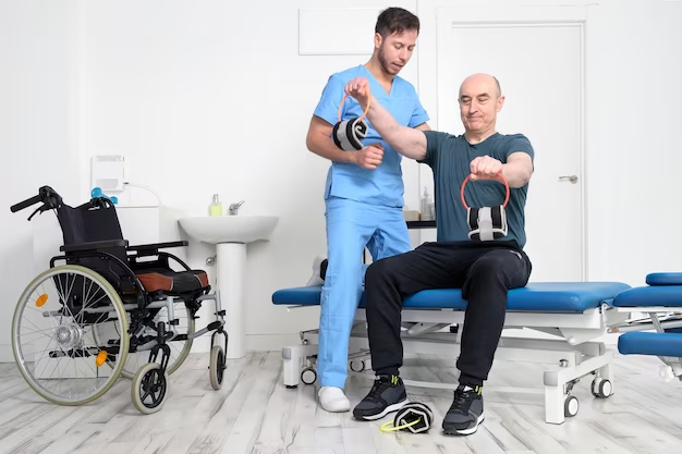 A pateint doing exercises and a doctor watching him